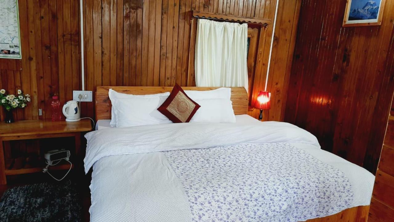 Ishan Log Huts-A Boutique Home Stay Banjār Εξωτερικό φωτογραφία
