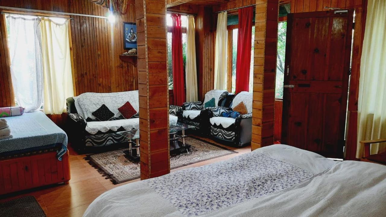 Ishan Log Huts-A Boutique Home Stay Banjār Εξωτερικό φωτογραφία
