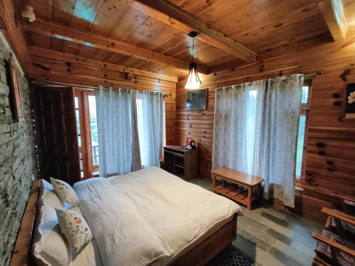Ishan Log Huts-A Boutique Home Stay Banjār Εξωτερικό φωτογραφία