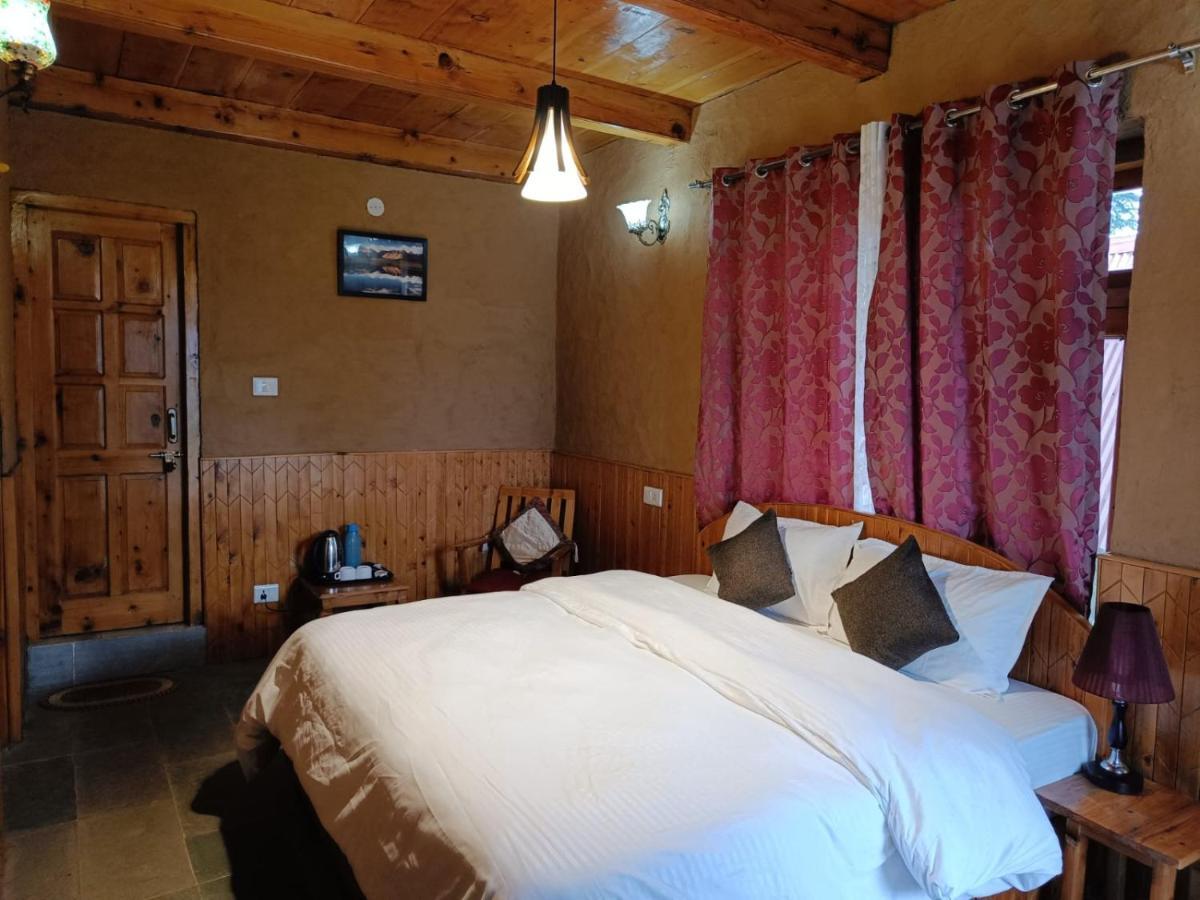 Ishan Log Huts-A Boutique Home Stay Banjār Εξωτερικό φωτογραφία