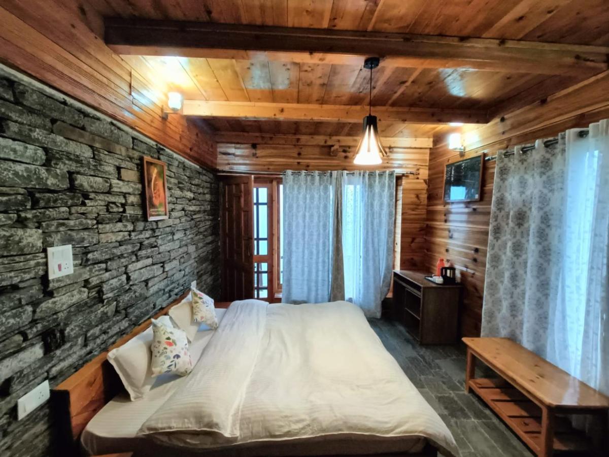 Ishan Log Huts-A Boutique Home Stay Banjār Εξωτερικό φωτογραφία