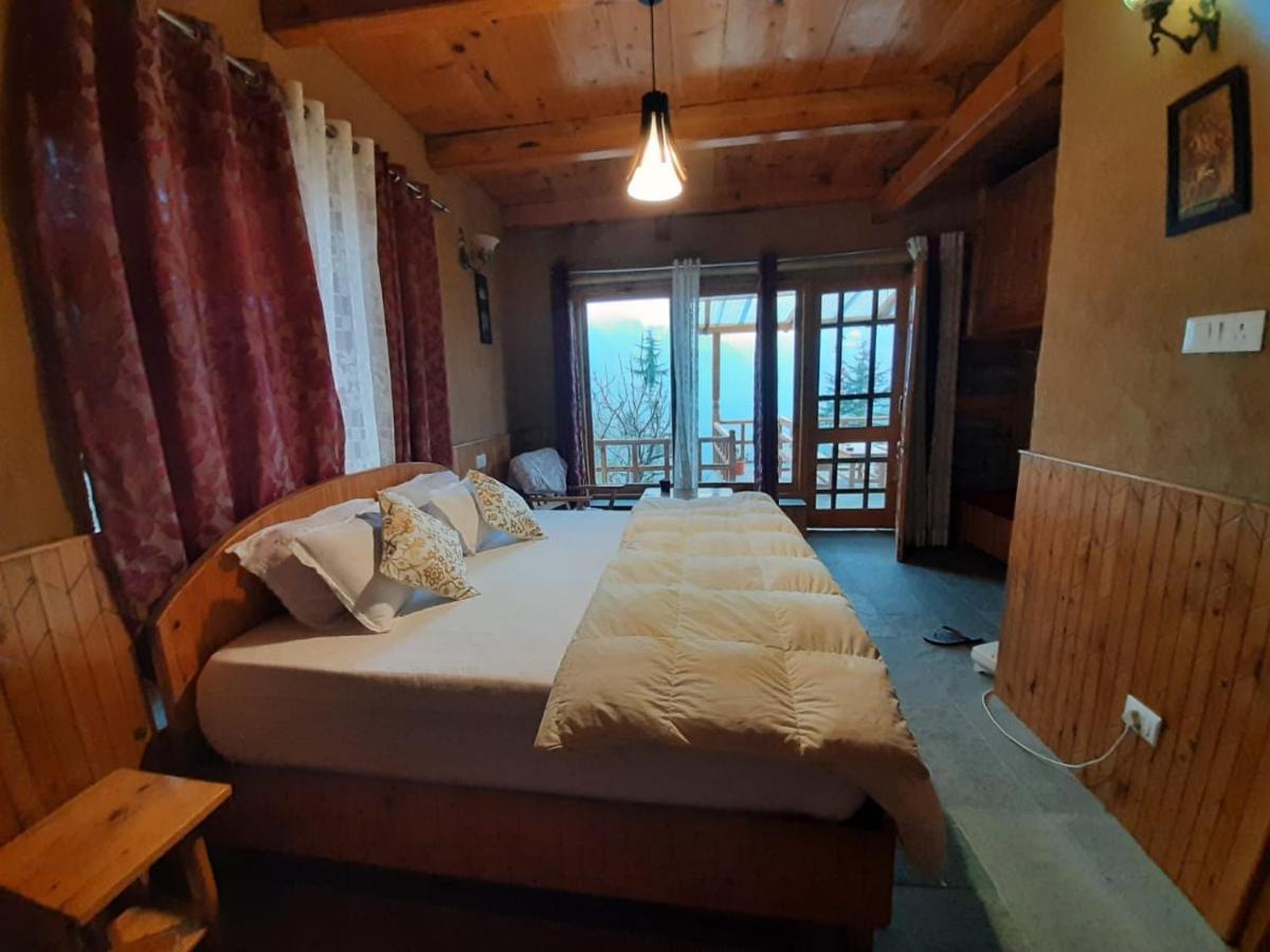 Ishan Log Huts-A Boutique Home Stay Banjār Εξωτερικό φωτογραφία